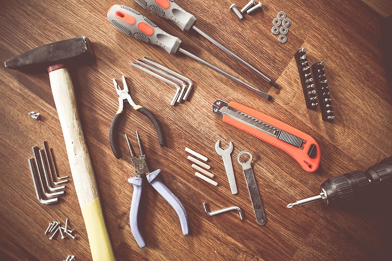 A neatly arranged set of professional handyman tools